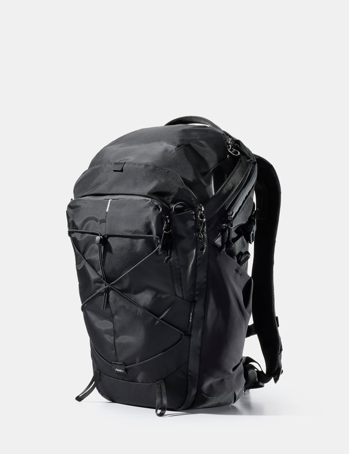Black backpack on a white background