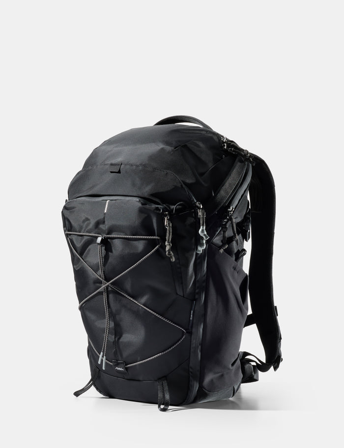 Black backpack on a white background