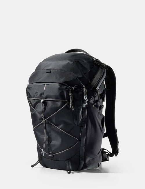 Black backpack on a white background