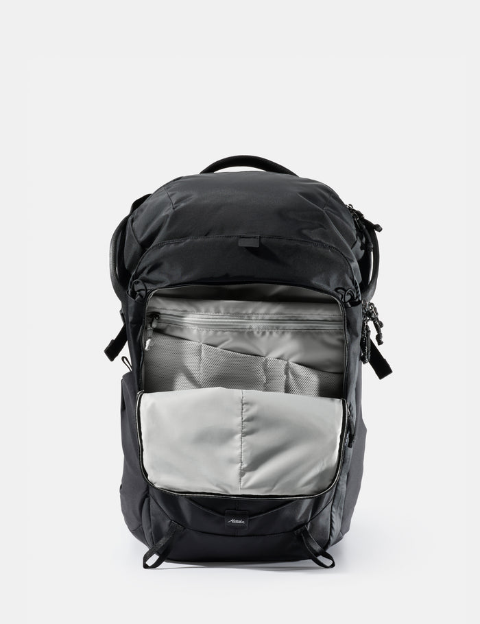 Black backpack with a gray compartment on a white background
