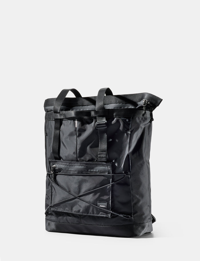 Black tote pack on a white background