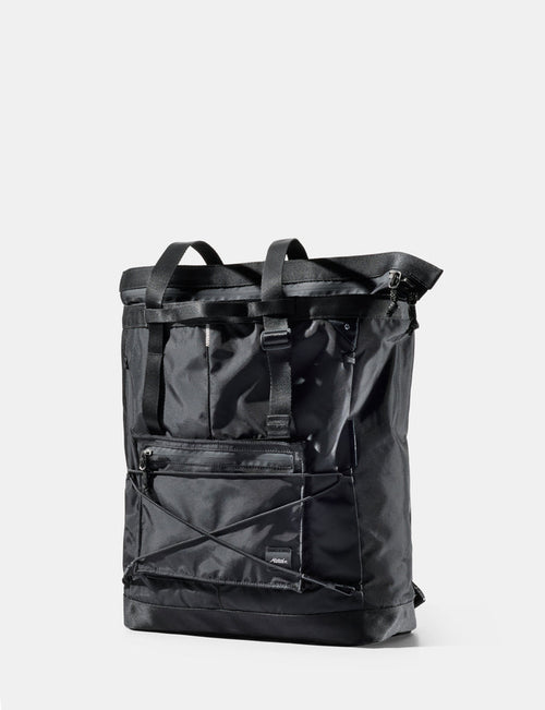Black tote pack on a white background