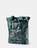 Green tote bag with multiple straps on a white background