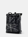 Black tote with white accents on a light gray background