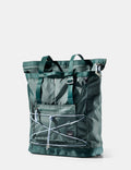 Green backpack with a white background