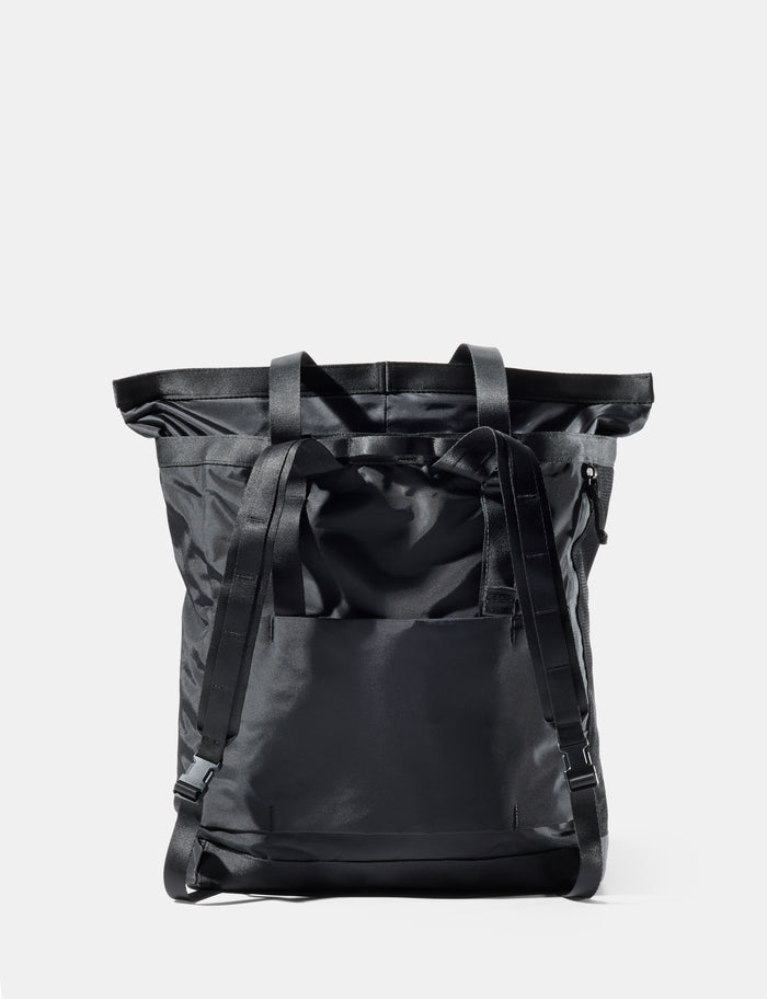 Black tote pack on a light gray background