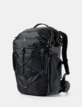 Black backpack on a light gray background