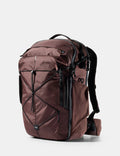 garnet backpack with black straps on a white background