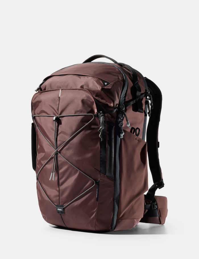 garnet backpack with black straps on a white background