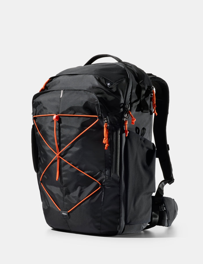 Black backpack with orange accents on a white background