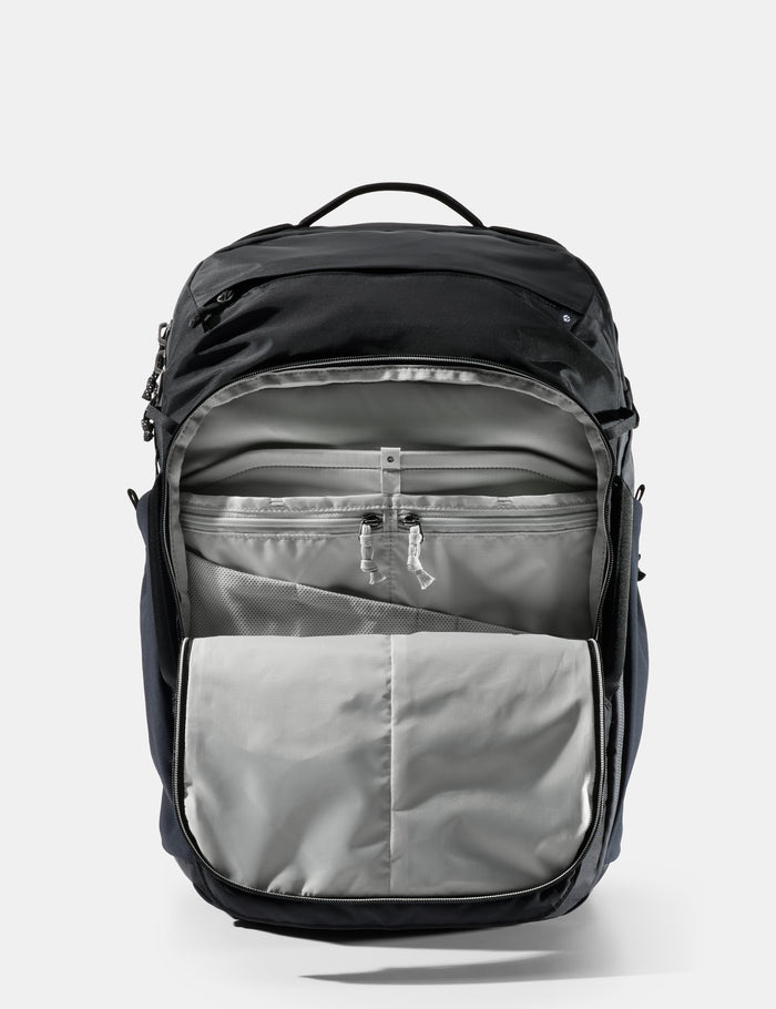 Black and gray backpack on a light gray background