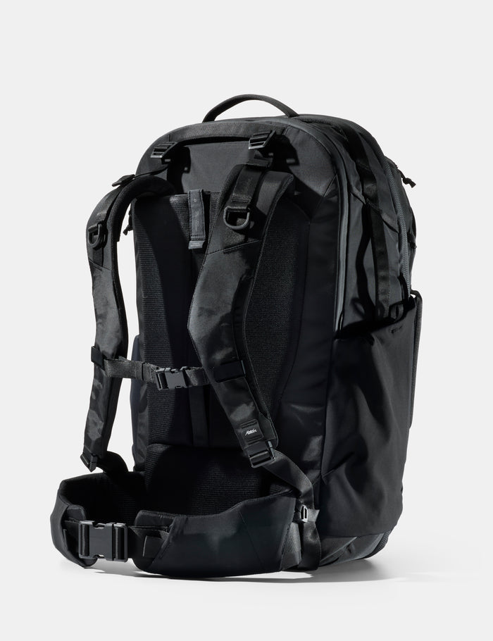 Black backpack on a white background