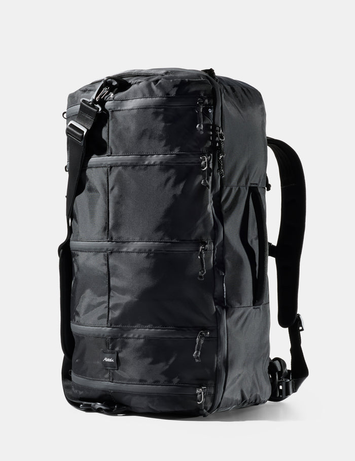 Black backpack on a white background