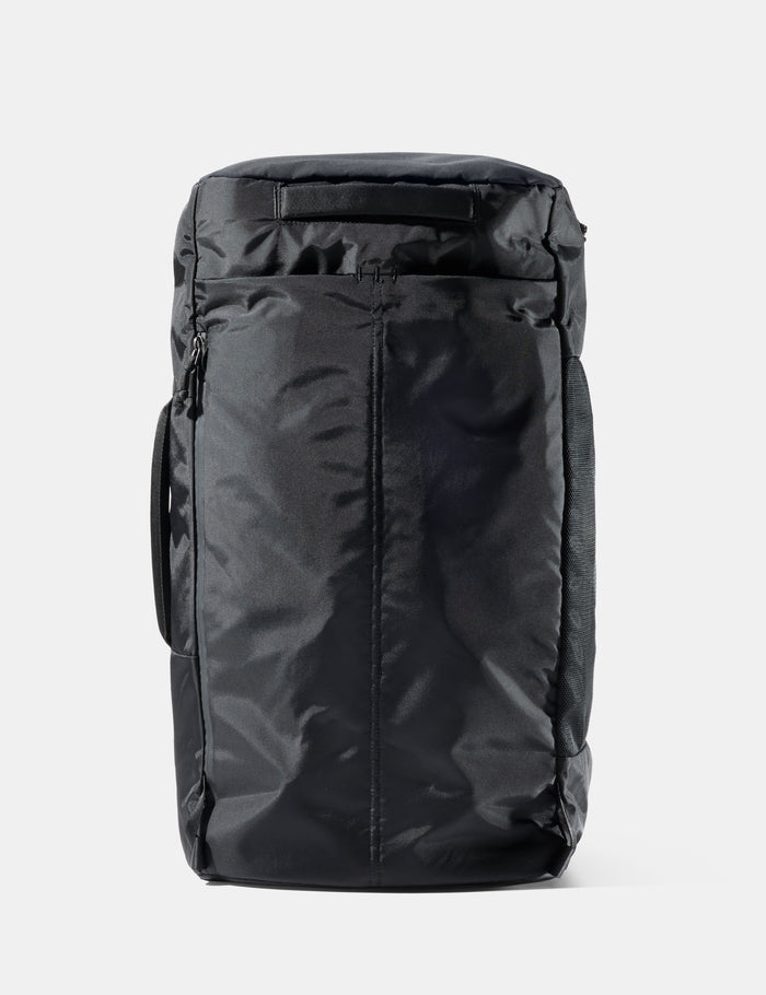 Black backpack on a white background