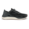 Black Olukai ʻAhi athletic shoe with cream midsole and textured upper, shown in profile view.