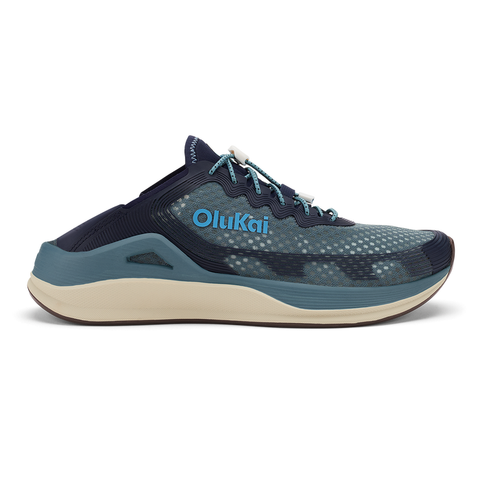 Olukai ʻAhi running shoe in storm blue and trench blue with cream midsole and teal laces.
