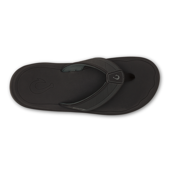 Black flip-flop sandal with textured thong strap and embossed wave logo on sole.