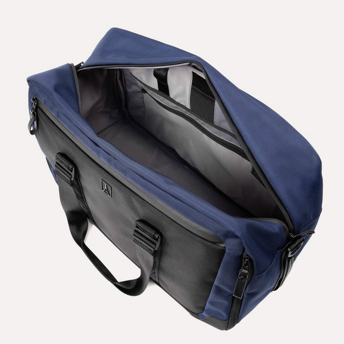 Open top view of the Travelpro® Altitude™ Double Expansion Duffel in Aviator Navy/Black, showcasing a spacious main compartment with an interior zippered pocket and dual padded handles