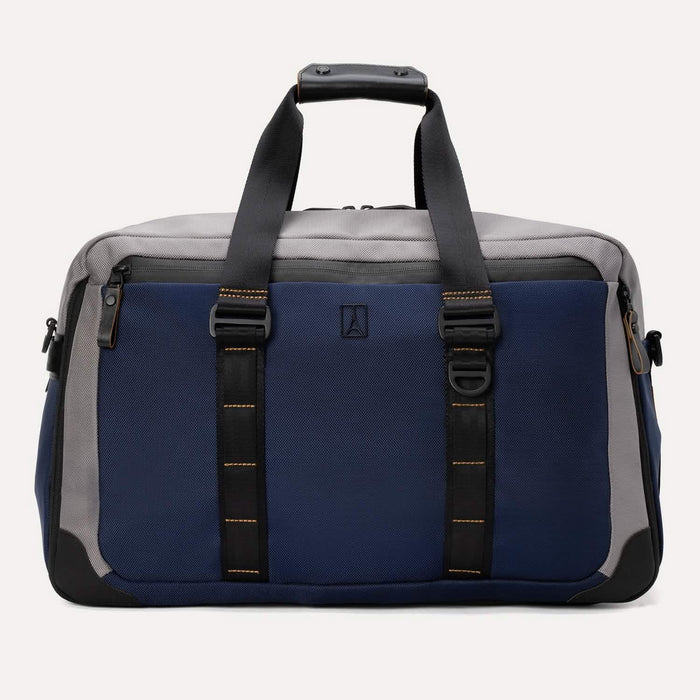 Rear view of the Travelpro® Altitude™ Double Expansion Duffel in Stellar Navy/Grey, featuring dual carry handles with reinforced stitching and a large exterior slip pocket holding a smartphone.