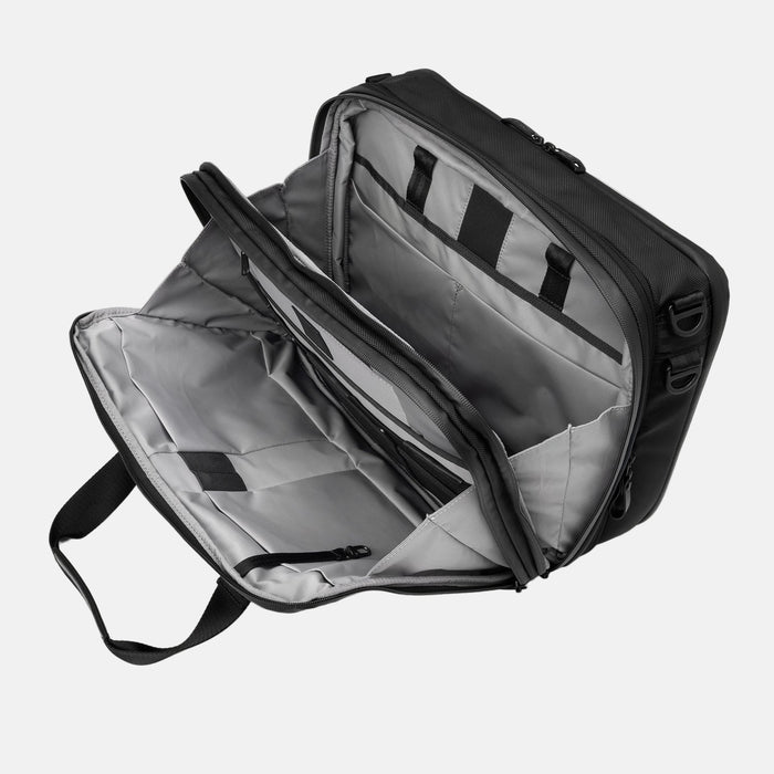 Open view of the Travelpro® Altitude™ Full Expansion Brief in black, showing three spacious compartments with divider panels and organizational sleeves for efficient packing and document storage.