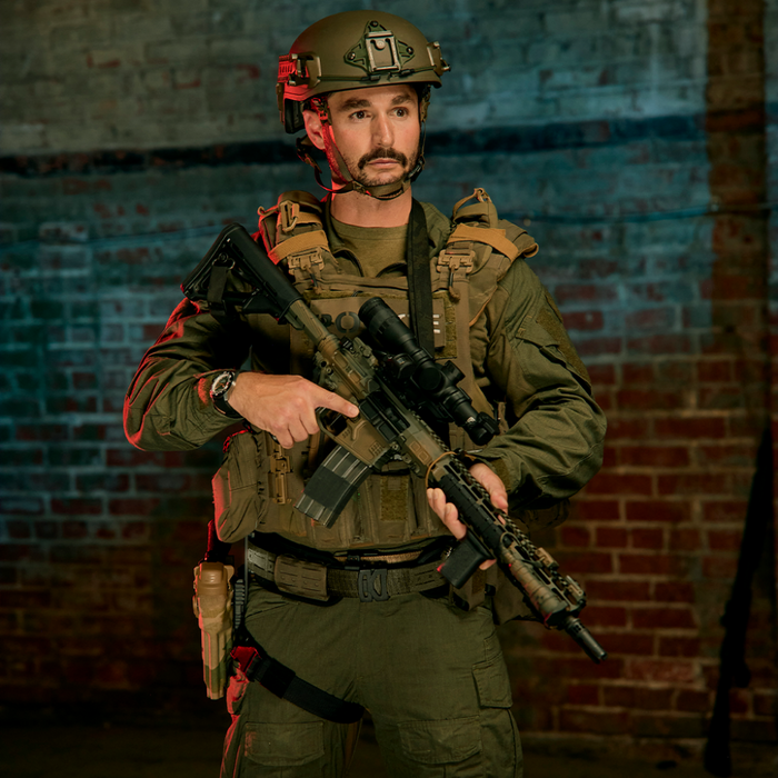 Police Officer Wearing a Kore Essentials Ranger Green Molle Battle Belt with Kore Essentials Attachments Equipped to the Belt