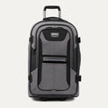 front view of the gray black bold by travelpro medium check-in expandable rollaboard suitcase standing upright, showcasing its rugged black and gray polyester exterior, spacious front zippered pocket, sturdy rubberized carry handle, and extended telescoping aircraft-grade handle.