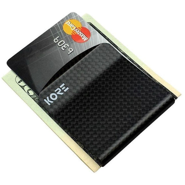 Kore Carbon Fiber money clip.  Military-grade carbon fiber strong as steel.  Kore Essentials. #carbonfiber #moneyclip #slimwallet #koreessentials #traklinebelt