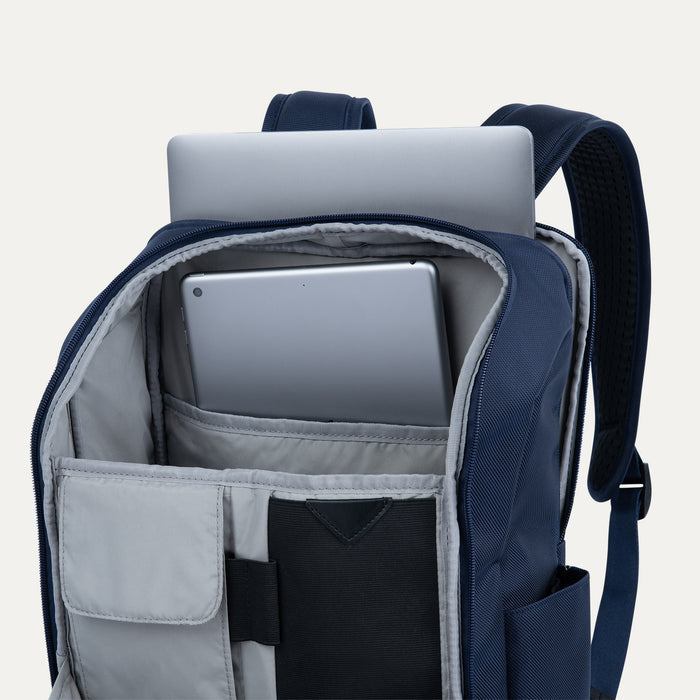 Interior detail view of the Crew Executive Choice 3 Slim Laptop Backpack in Patriot Blue, showcasing the dedicated, padded laptop and tablet sleeves designed to secure electronics with easy access.