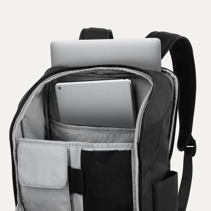 Front view of the Crew Executive Choice 3 Slim Laptop Backpack in Black, highlighting its sleek profile and convenient exterior quick-access pockets.