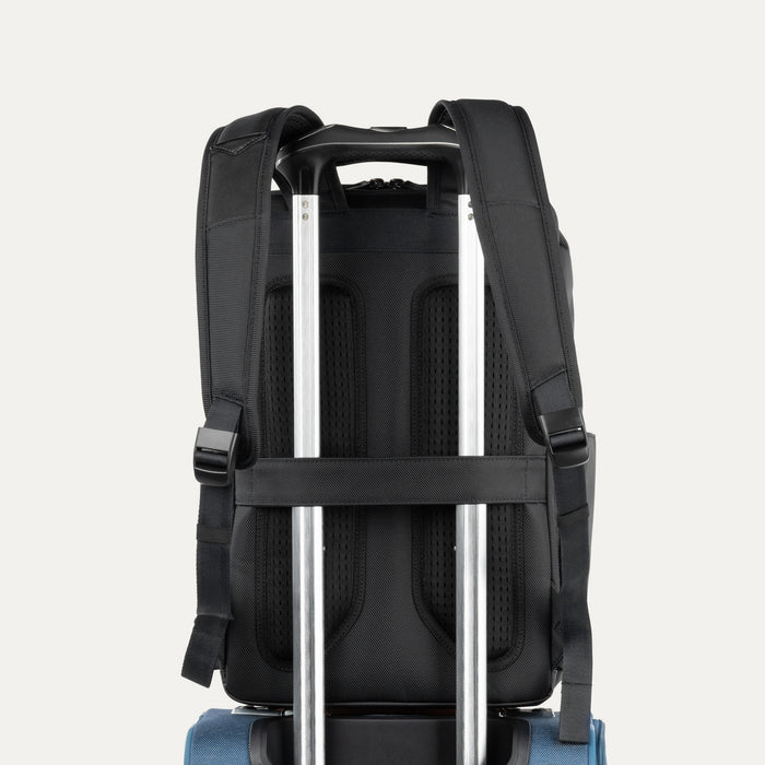 Rear view of the Crew Executive Choice 3 Slim Laptop Backpack, showcasing the ergonomic airflow back panel and the integrated rear stacking strap designed for secure, hands-free mobility on roller luggage.