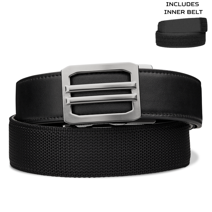 A black Kore Essentials hybrid executive protection belt with a gunmetal X1 buckle and a woven black strap, shown on a white background with a small inset image in the top right reading 'INCLUDES INNER BELT'.