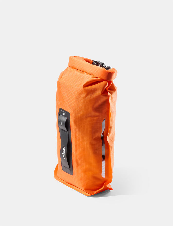 Orange dry bag on a white background