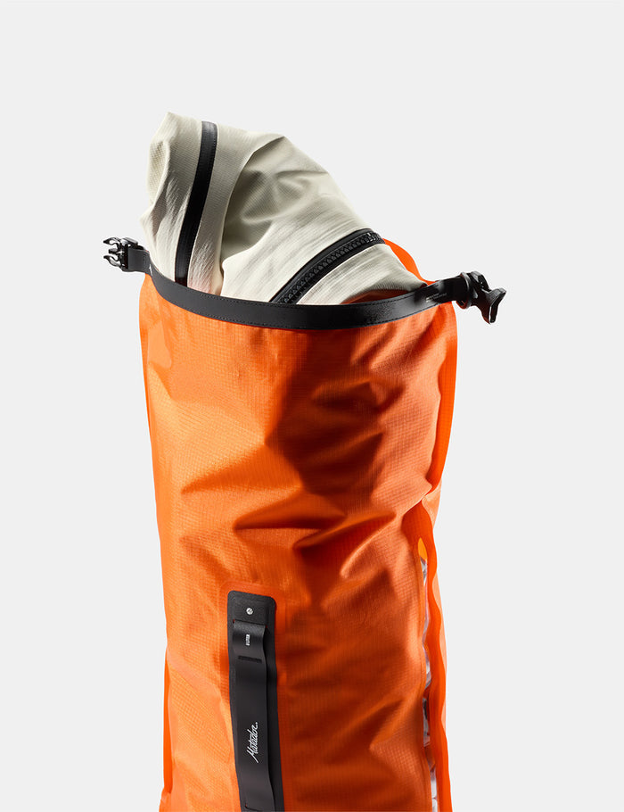 open orange drybag on white background