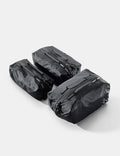 Three black gear cubes on a white background