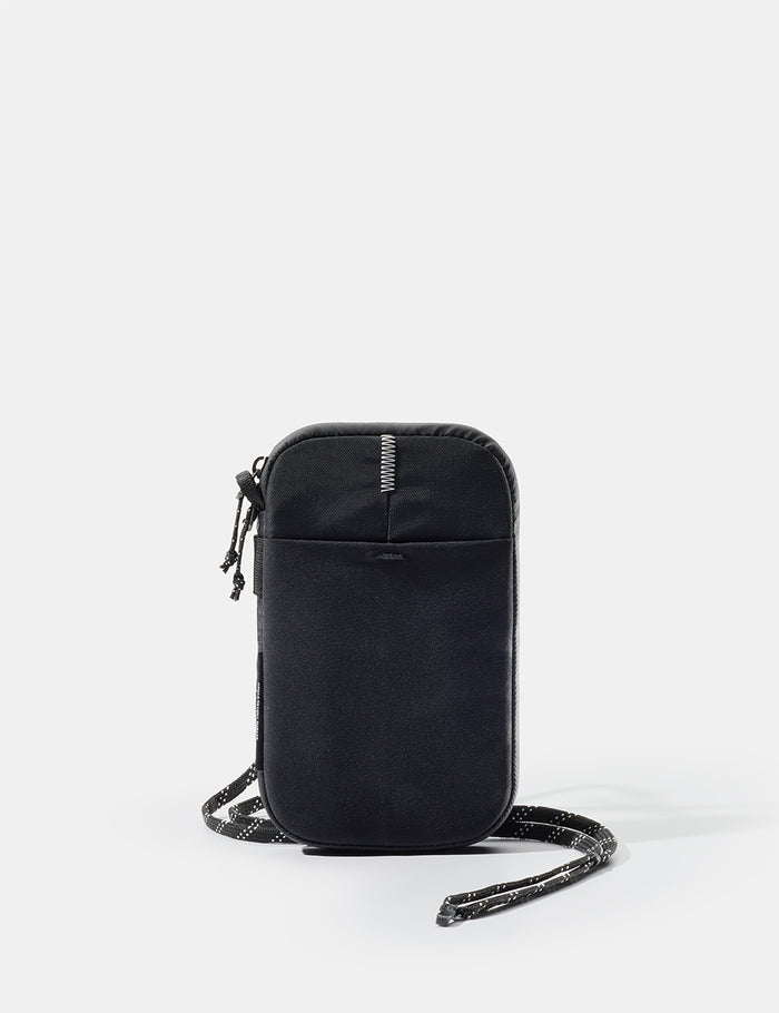 Black travel wallet on white background