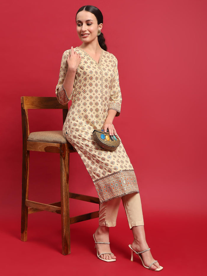 Indiessence Women Liva (Rayon) Beige Ornamental Print Kurta With Trouser.