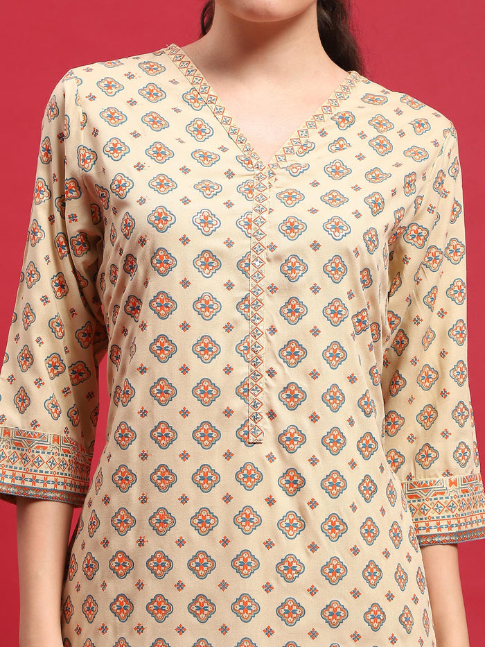 Indiessence Women Liva (Rayon) Beige Ornamental Print Kurta With Trouser.