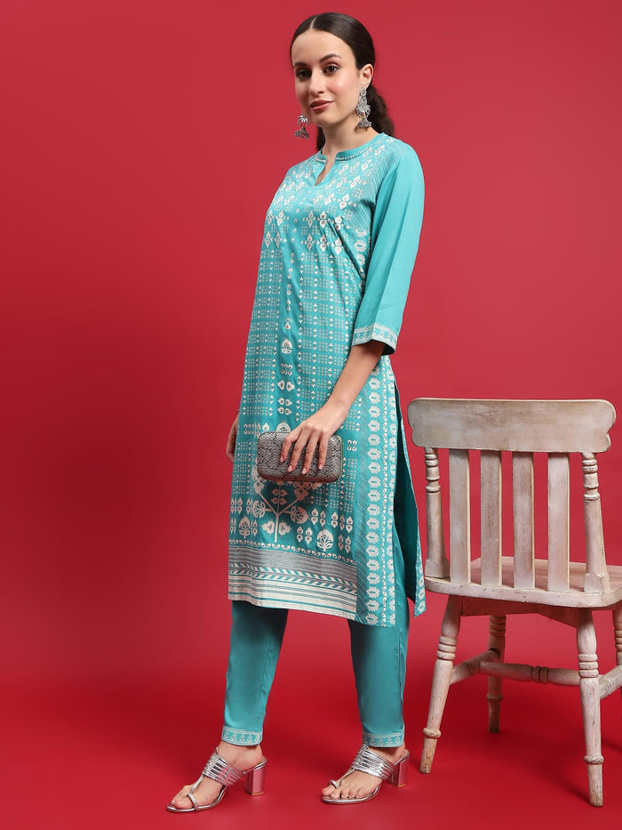 Indiessence Women Liva (Rayon) Turquoise Blue Ornamental Print Kurta With Trouser.