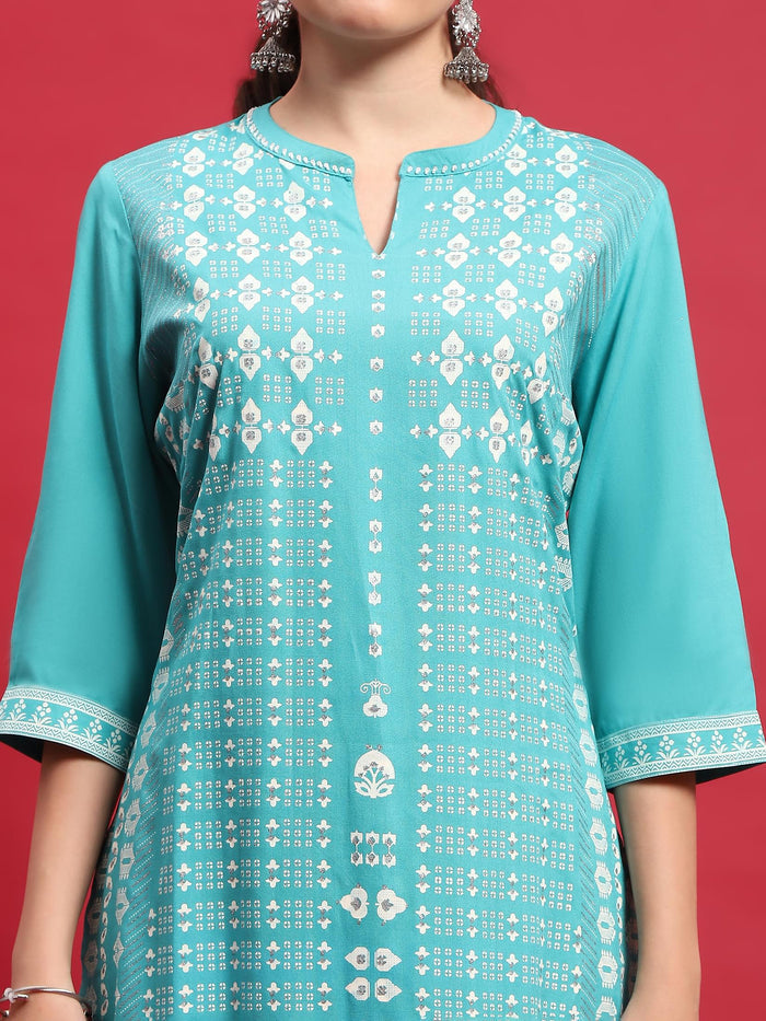 Indiessence Women Liva (Rayon) Turquoise Blue Ornamental Print Kurta With Trouser.