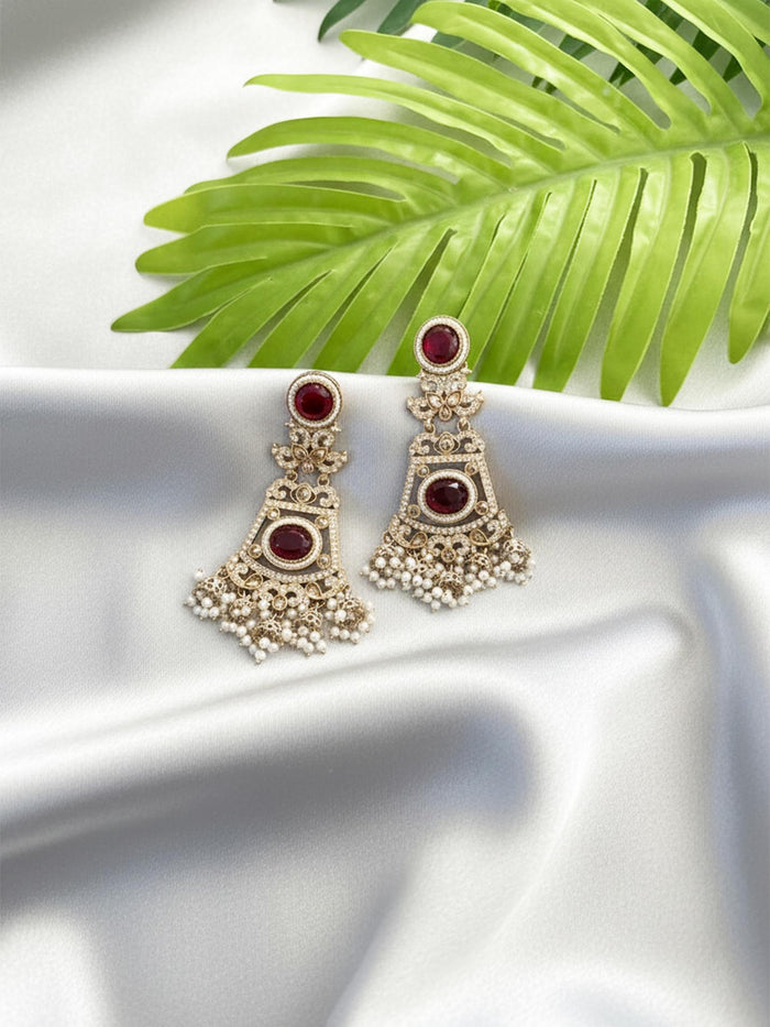 Intricate Kundan Jhumkas With Maroon Stones.