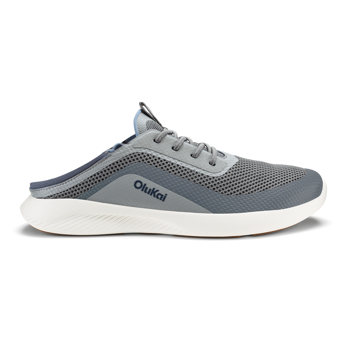 Charcoal and sharkskin slip-on running shoe with mesh upper, white sole, and Olukai branding on the side.