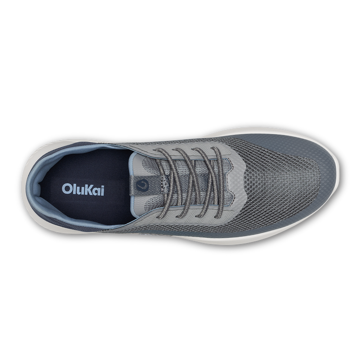 Charcoal mesh athletic shoe with gray laces, white sole, and navy blue interior lining, shown from above.