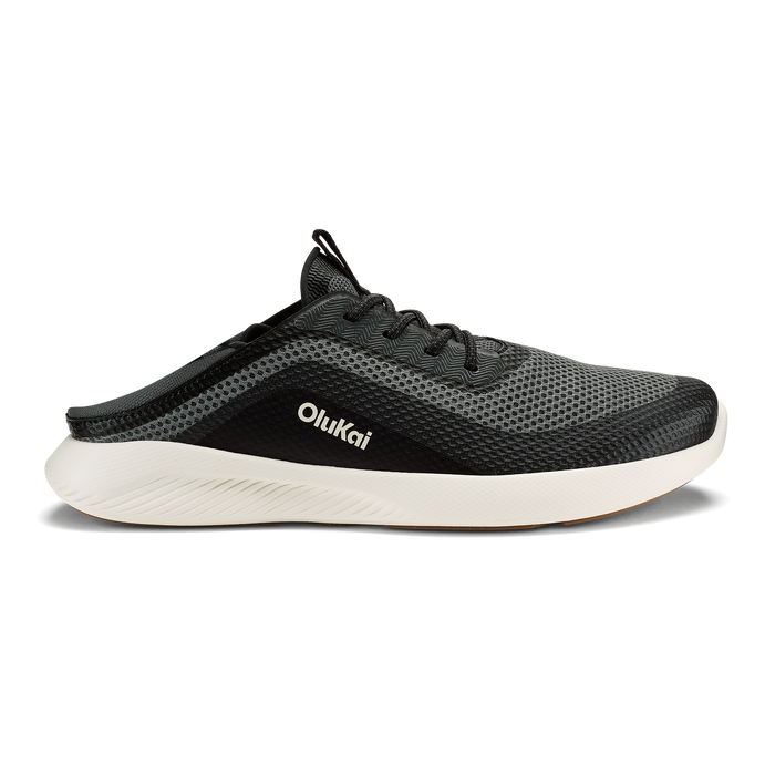 Black mesh athletic shoe with white sole and OluKai branding on the side.