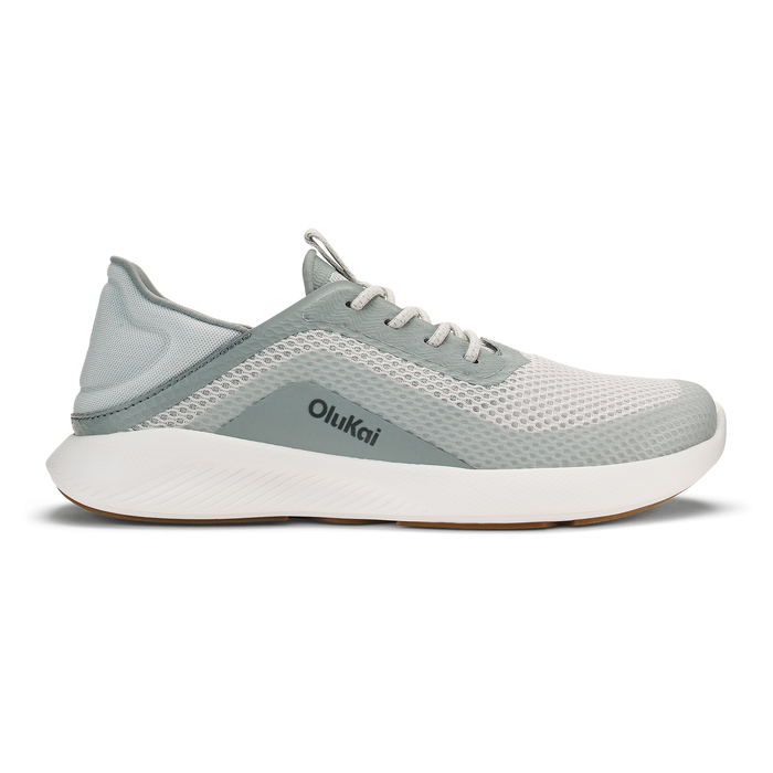Olukai Kialoa running shoe in sterling gray and white with mesh upper and white cushioned sole.