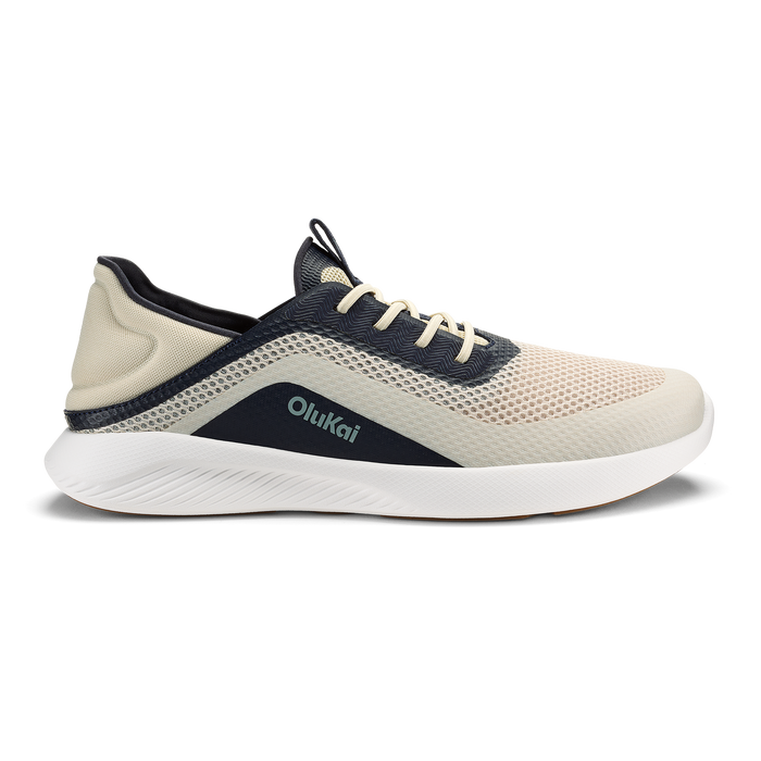 Kialoa sneaker in cream and navy with mesh upper, white sole, and navy heel panel.