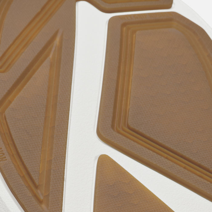 Tan and cream-colored tapa panel with geometric rectangular patterns and raised ridged details.