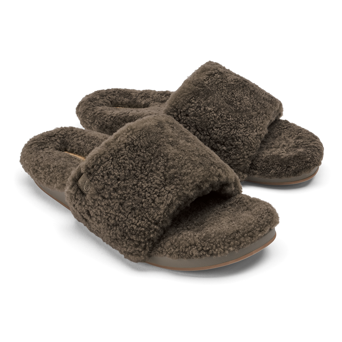 Pair of walnut-colored fleece slippers with cushioned soles and open-toe design.