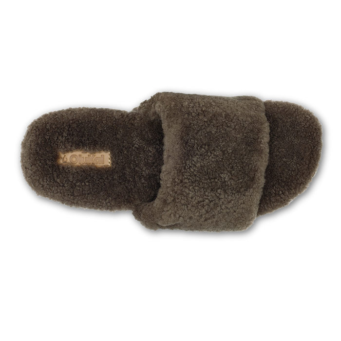 Walnut-colored fleece slippers with rounded toe and heel, shown from above in neutral lighting.