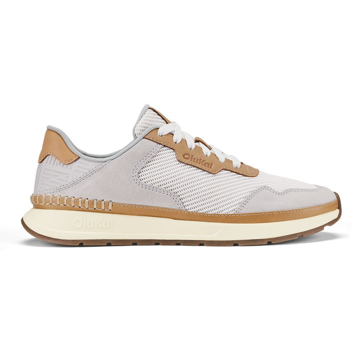 White and tan mesh running shoe with cream-colored sole and brown heel accent.