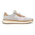 White and tan mesh running shoe with cream-colored sole and brown heel accent.